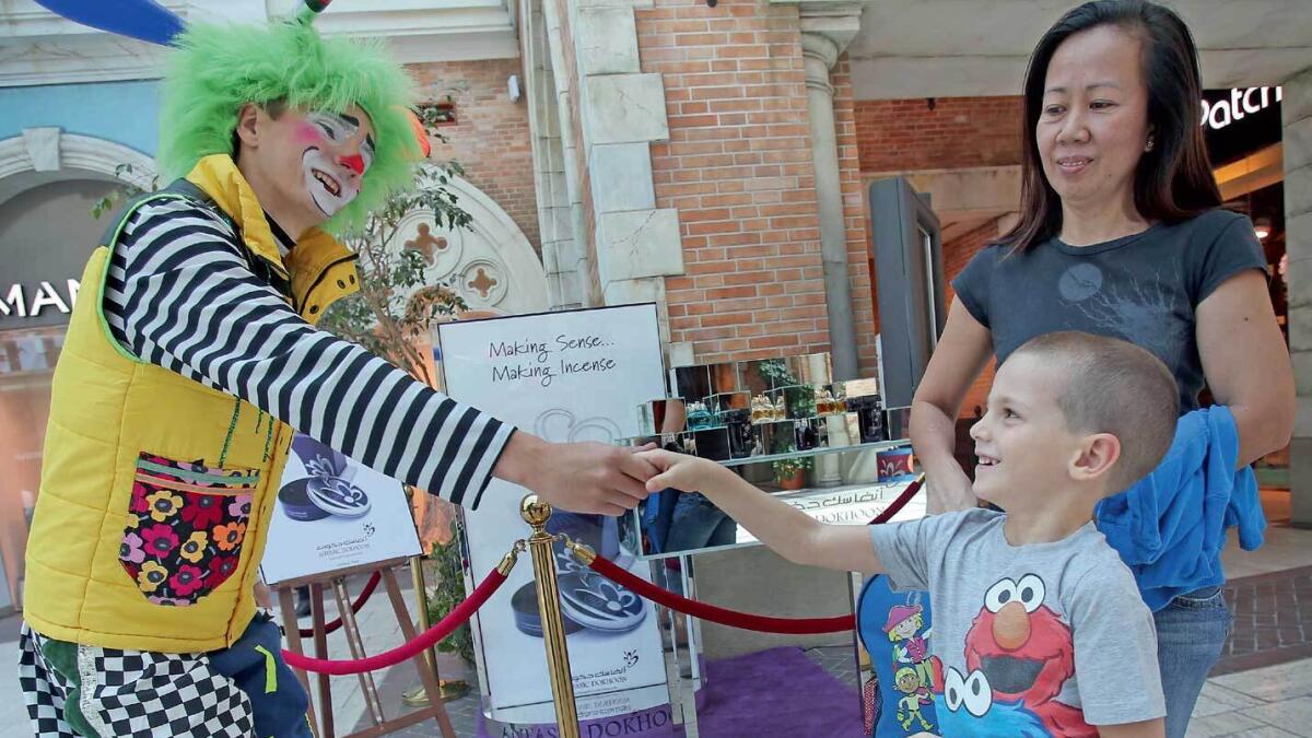 A JOLLY WELCOME ... One of the clowns in action in Mercato Mall, Dubai.