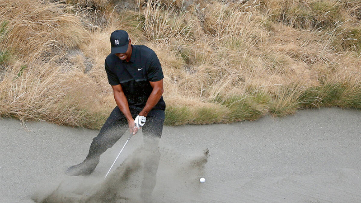 Tiger Woods sinks to bottom at Chambers Bay
