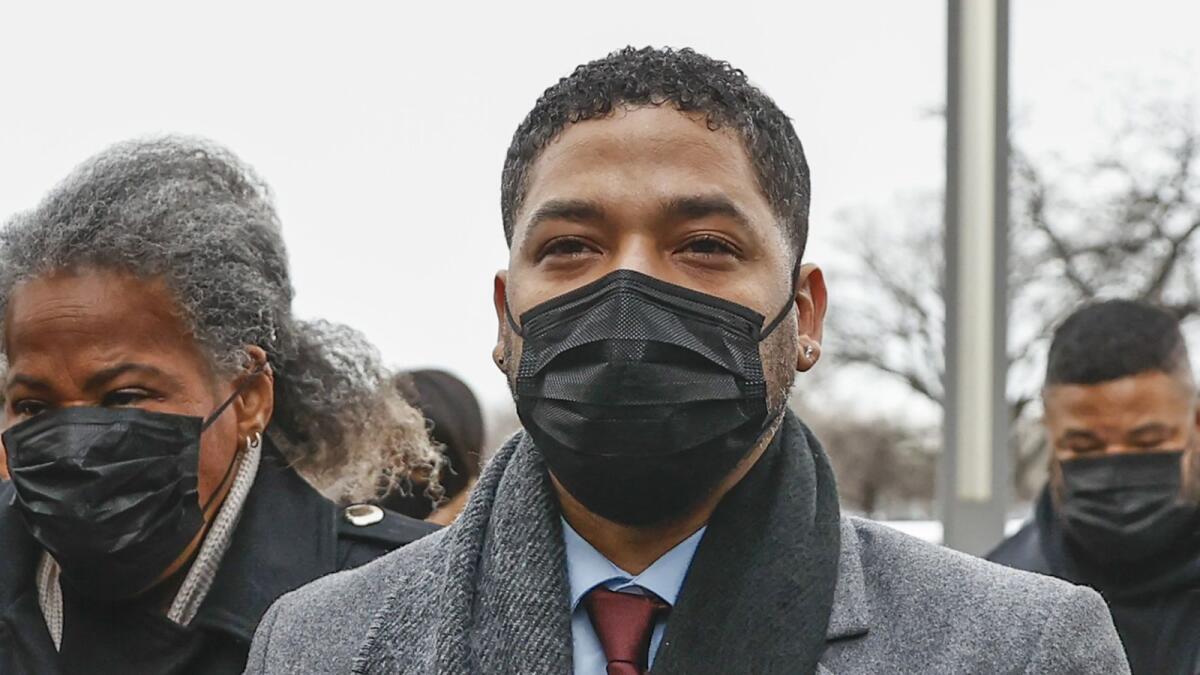 Jussie Smollett arrives with his mother Janet Smollett at the Leighton Criminal Court Building for his trial in Chicago, Illinois. – AFP
