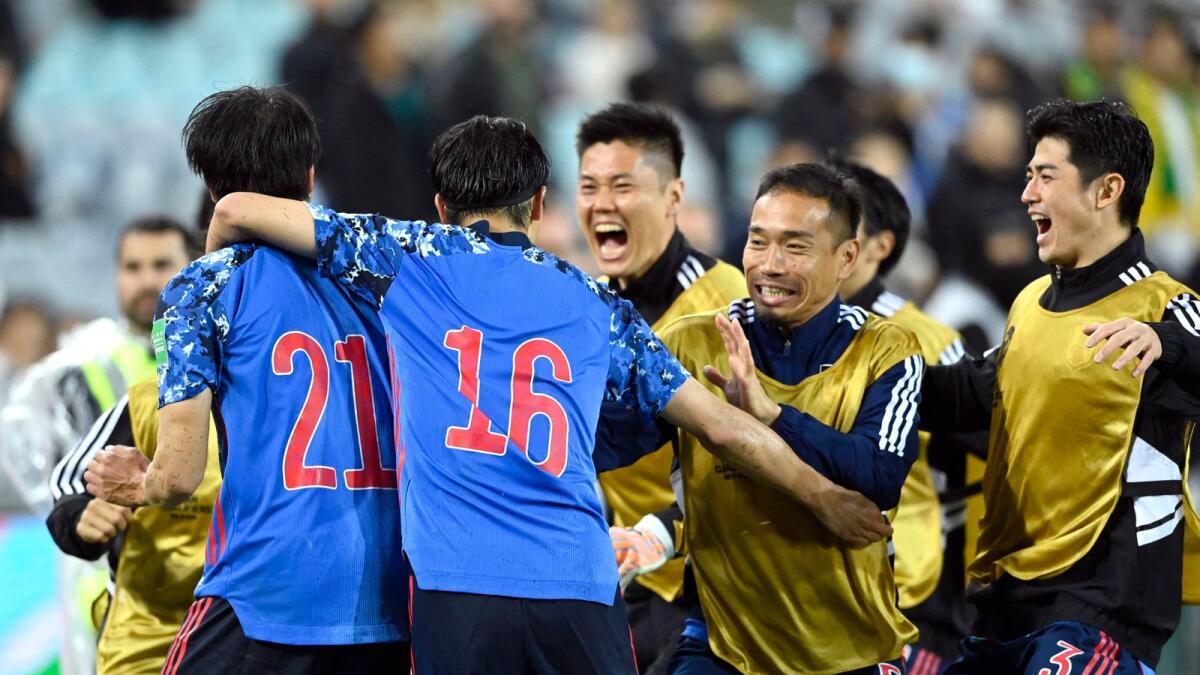 Japan's Kaoru Mitoma celebrates scoring their second goal with teammates. (Reuters)