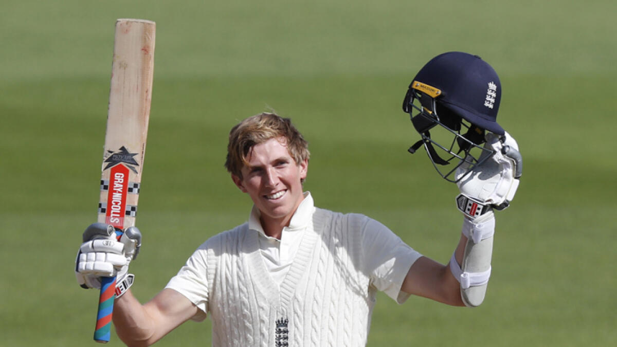 England's Zak Crawley celebrates scoring 200 runs during the second day of the third cricket Test against Pakistan. - AFP