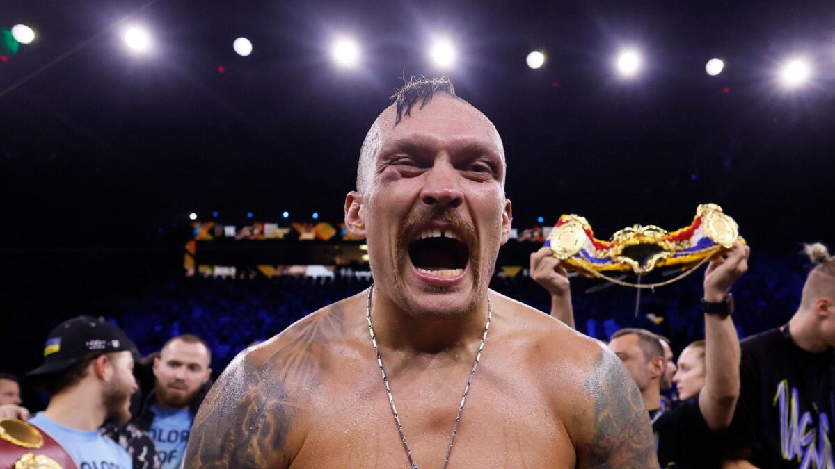 Oleksandr Usyk celebrates after winning his fight against Anthony Joshua. (Reuters)