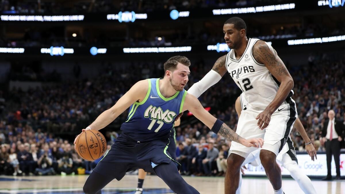 Doncic shines in return, Mavs maul Spurs