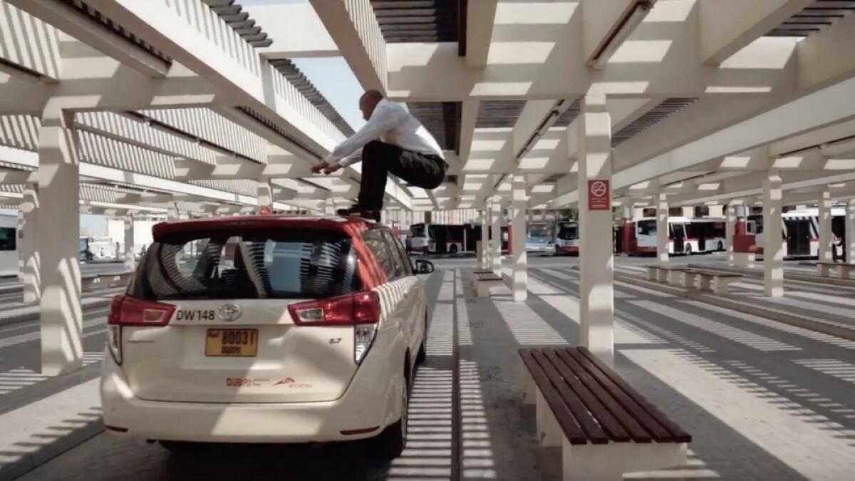 Video: Man jumps on Dubai cabs, buses to reach office on time