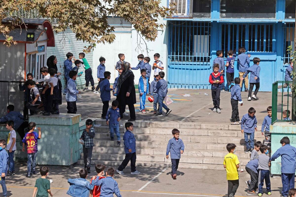 Iranian pupils play together at a school in Tehran on October 11, 2022. –  AFP file photo used for illustrative purpose only