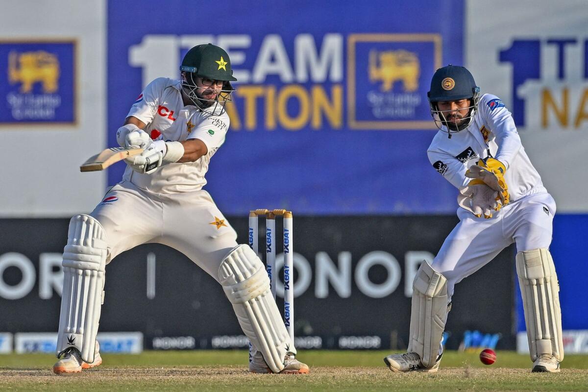 Pakistan's Imam-ul-Haq (left) plays a shot as Sri Lanka's wicketkeeper Sadeera Samarawickrama looks on. — AFP
