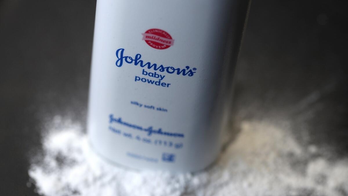 A container of Johnson's baby powder made by Johnson and Johnson sits on a table.- AFP
