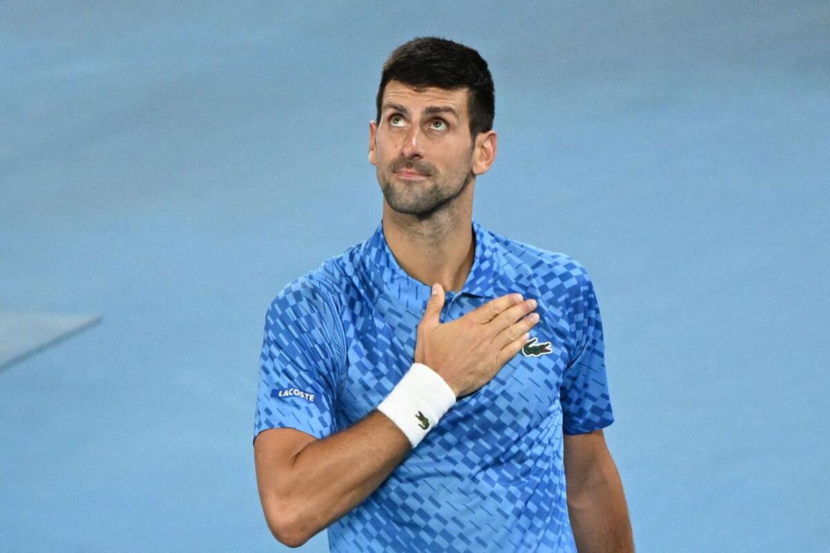 Serbia's Novak Djokovic celebrates his victory against Australia's Alex De Minaur at the Australian Open. — AFP