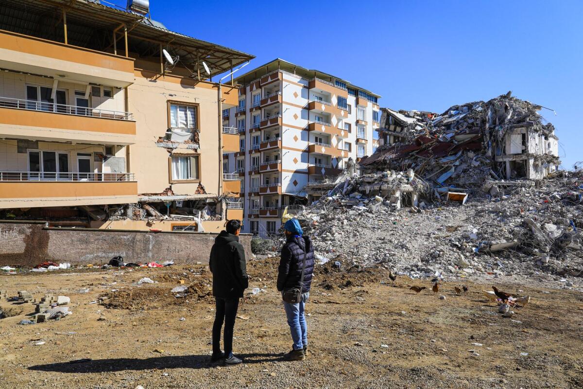 Residents look at what remained of their house in the Islahiye area after a 7.8-magnitude earthquake rocked Turkey last week. — Photos by Neeraj Murali
