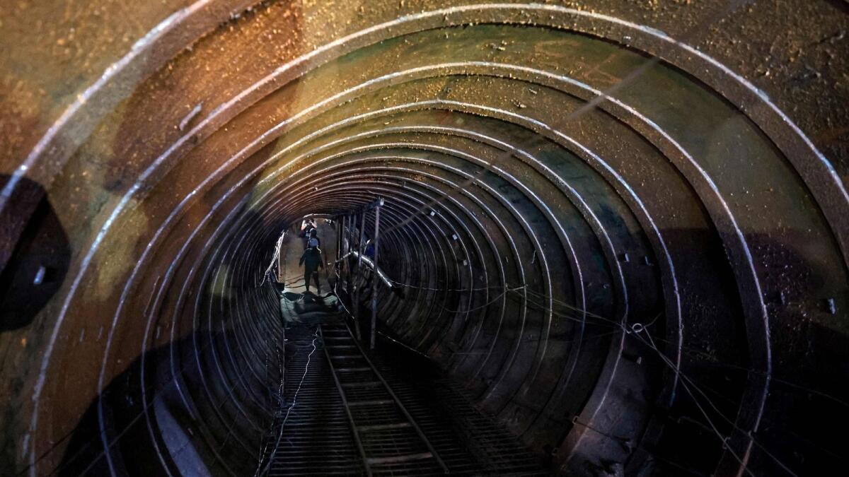 Israeli soldiers visit a tunnel that Hamas reportedly used to attack Israel through the Erez border crossing. — AFP