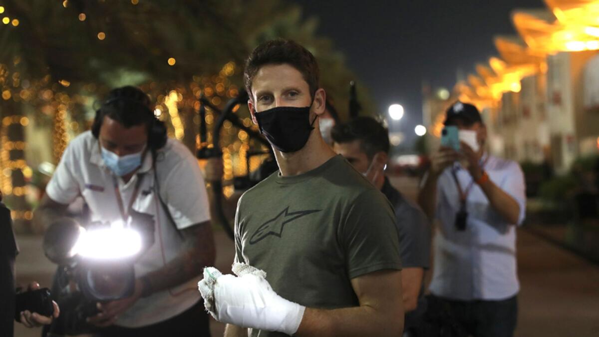 Haas driver Romain Grosjean paid a visit to the paddock on Thursday to thank the marshals during the Bahrain Grand Prix in Sakhir, Bahrain.— AP