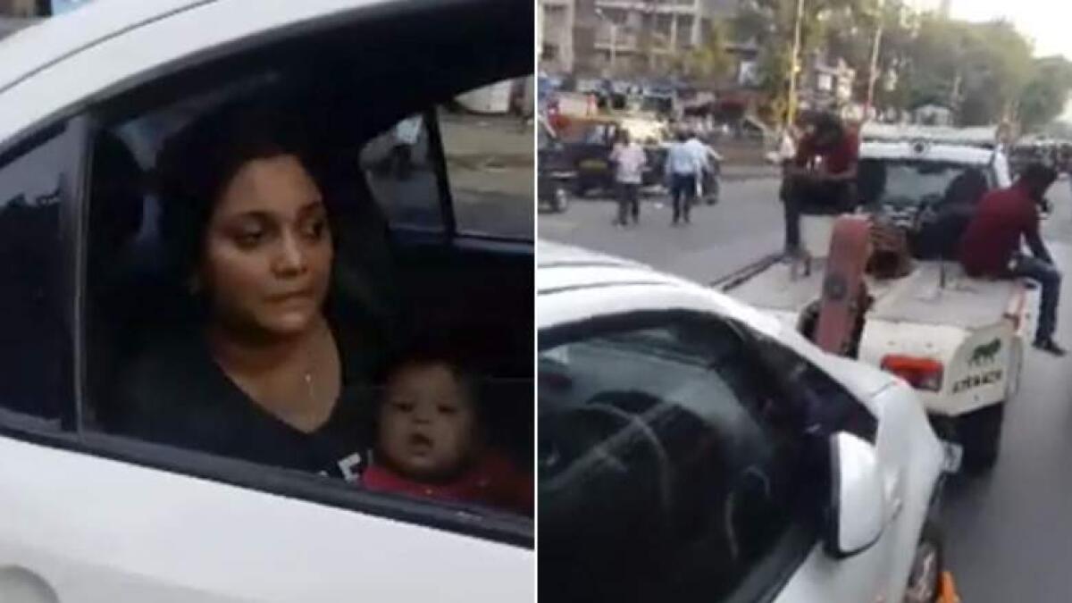 Mumbai policeman suspended after towing car with woman breastfeeding infant 
