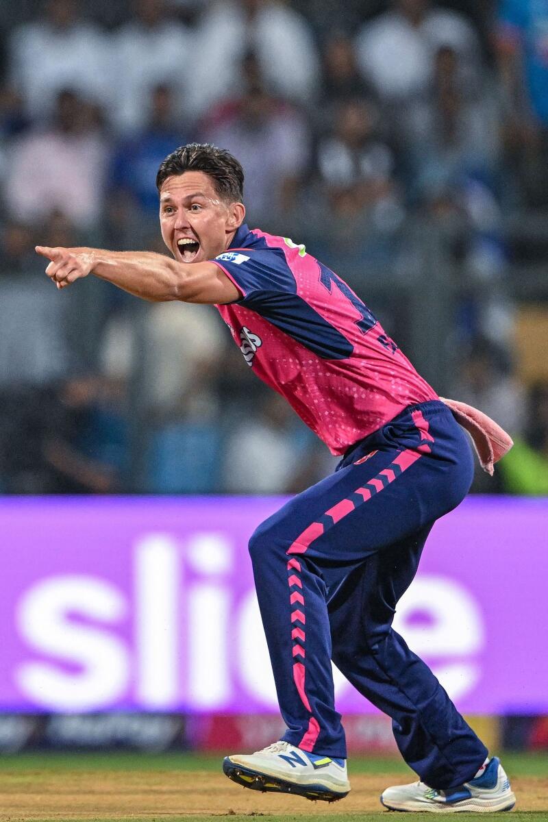 Rajasthan Royals' Trent Boult successfully appeals for a wicket against Naman Dhir. — AFP