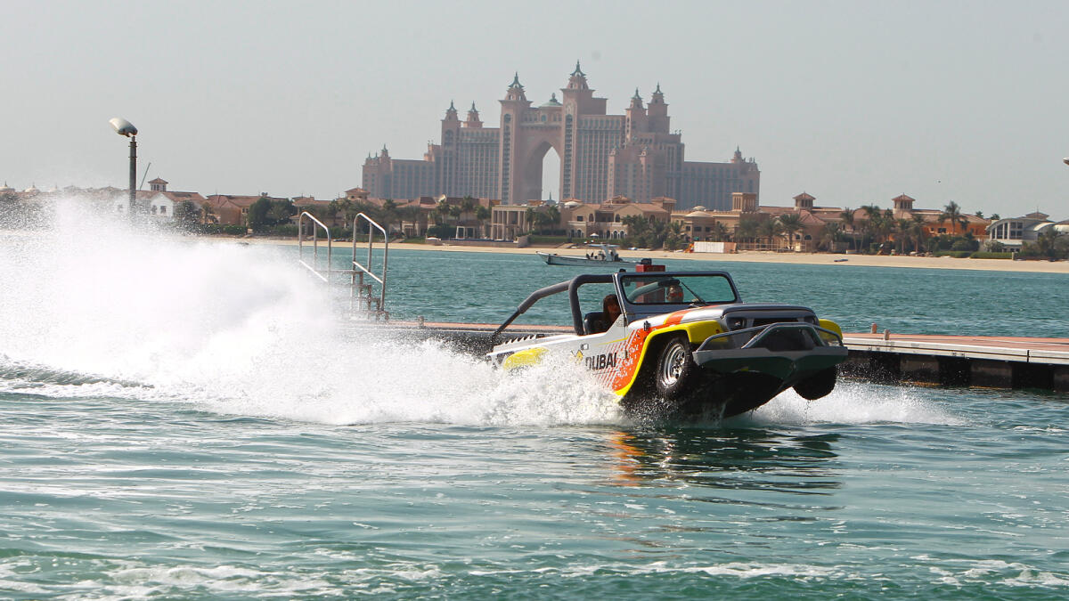 Specially-designed jeep rides on water during an event organised by the Department of Tourism and Commerce Marketing at the Palm Jumeirah, on Tuesday.