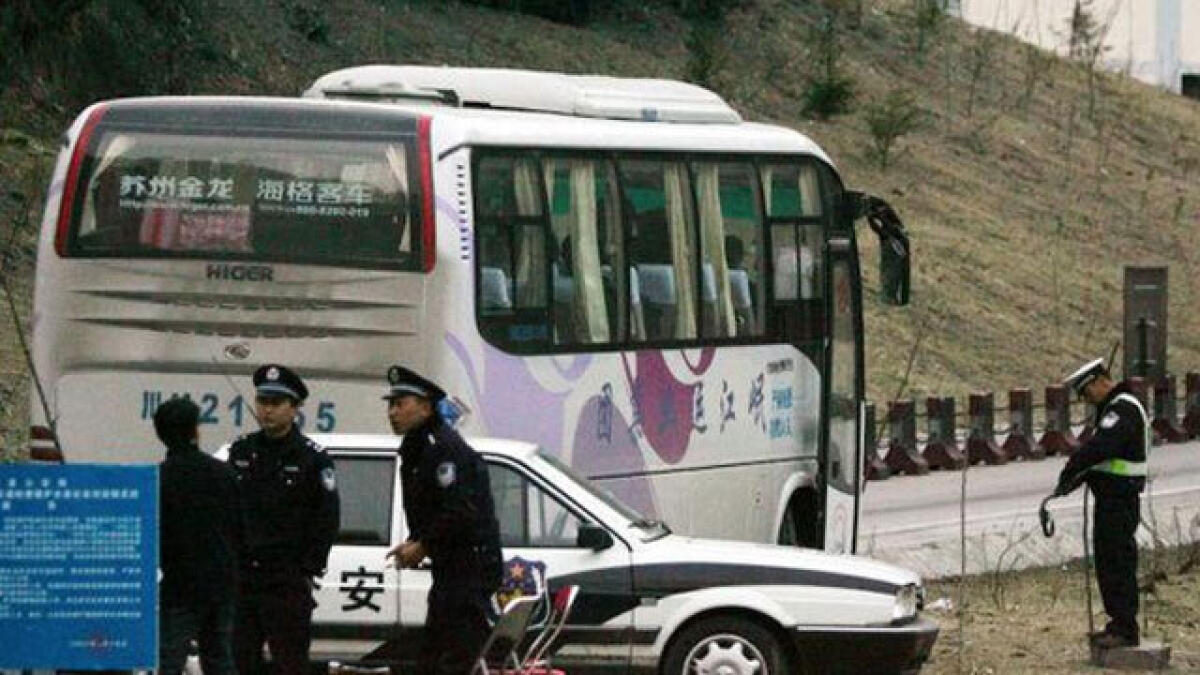 Tour bus plunges off cliff in Tibet, killing 11 people