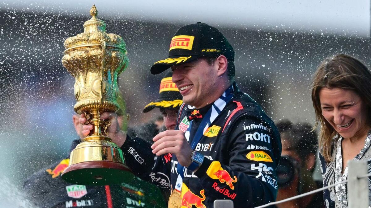 Winner Red Bull Racing's Dutch driver Max Verstappen holds the trophy at the Formula One British Grand Prix. — AFP