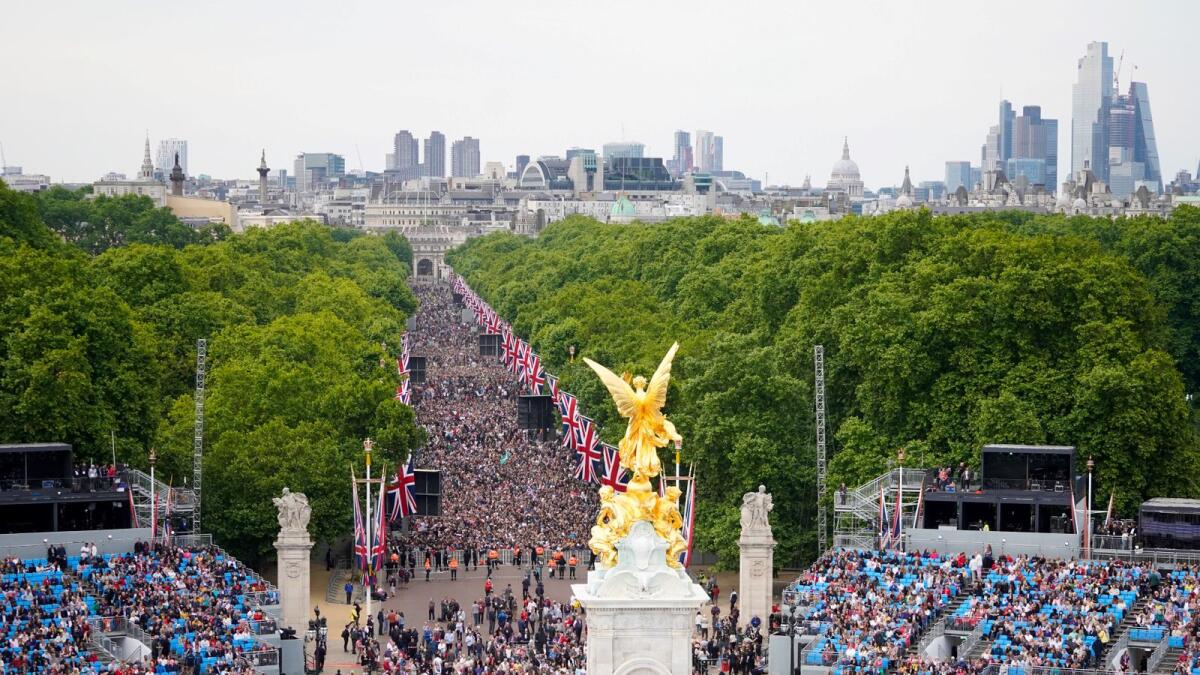 People gather at The Mall to attend the Platinum Party at Buckingham Palace. Photo: AFP