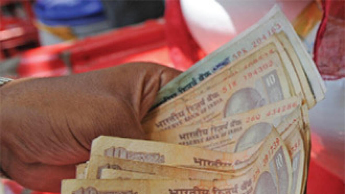Indian rupee hits record closing low