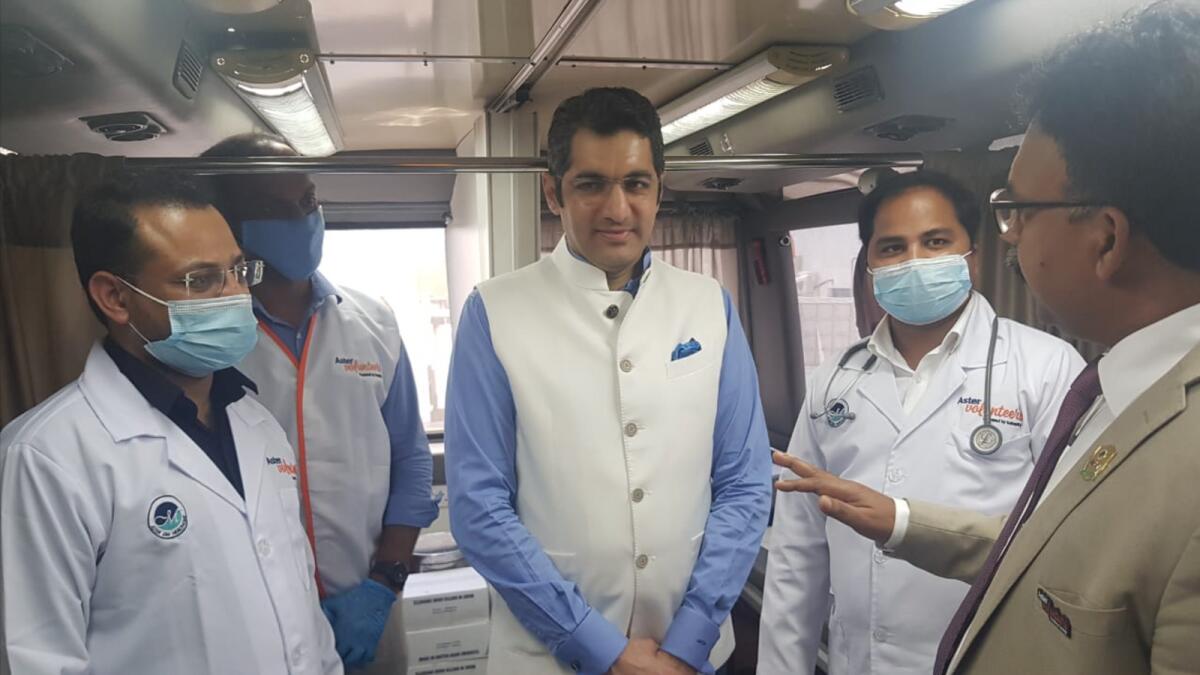 Dr Aman Puri with a medical team and other officials during Indian consulate's outreach programme, Breakfast with the Consul-General', at Amber Packaging Industries LLC, Ras Al Khaimah. — Supplied photo