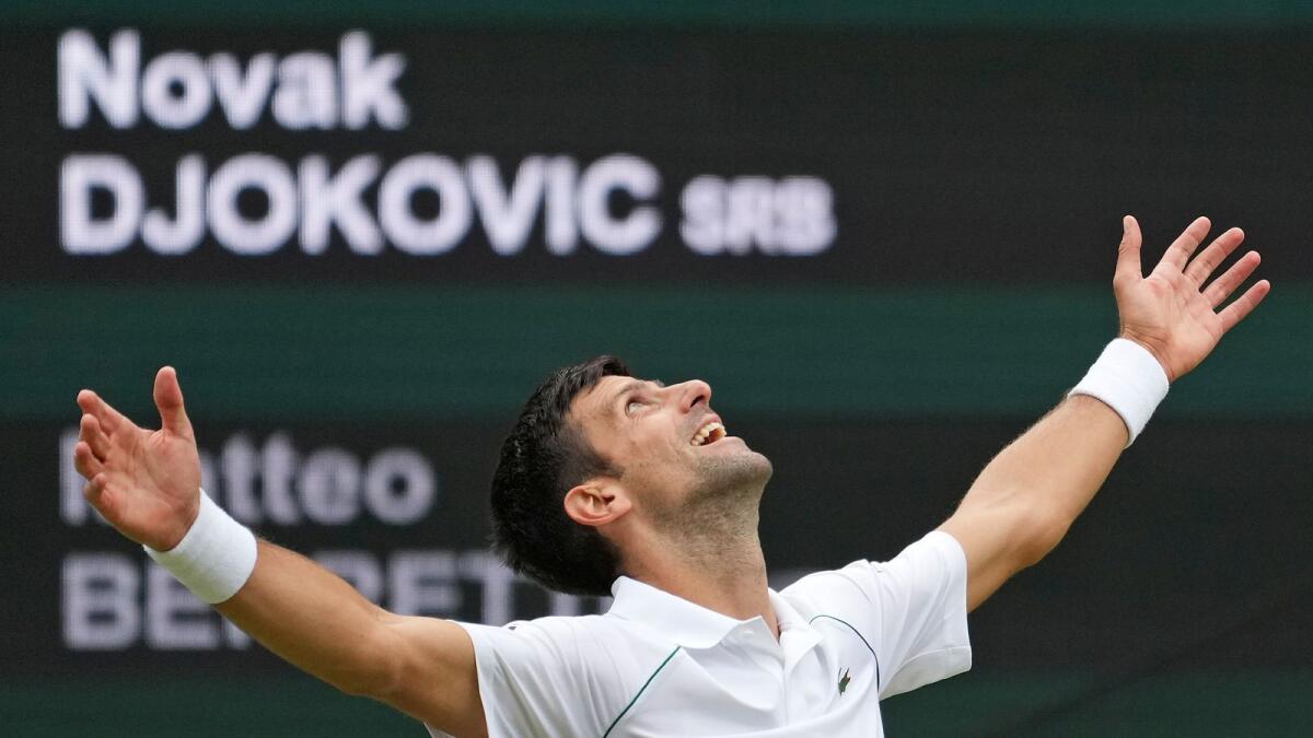 Serbia's Novak Djokovic celebrates his victory over Italy's Matteo Berrettini in the men's singles final. — AP