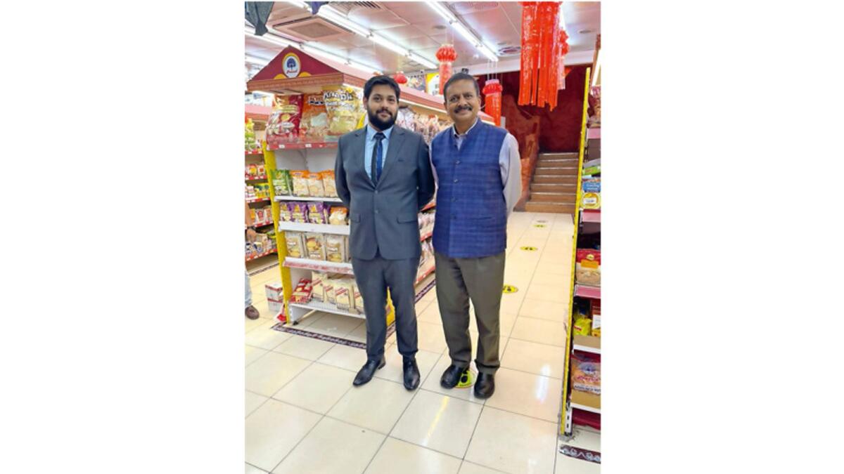 Ranjan P Thakur, principal secretary, industry commerce and aviation, government of Jammu and Kashmir, with Hrishikesh Datar, director at Al Adil Group.