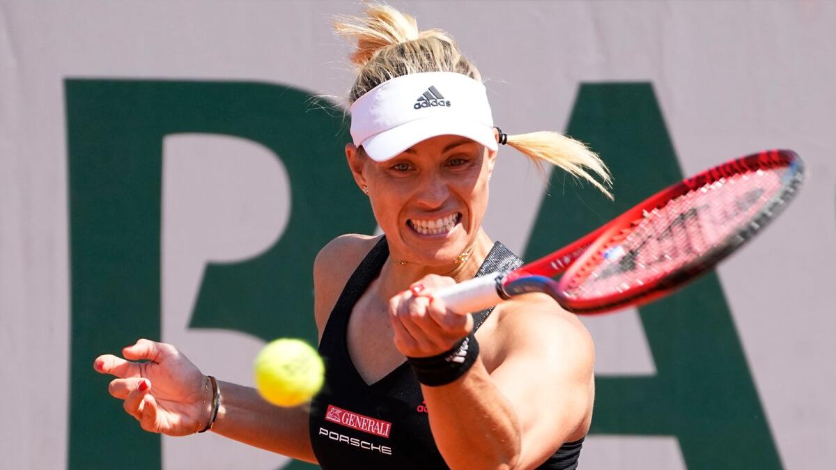 Germany's Angelique Kerber slams a forehand to Ukraine's Anhelina Kalinina during their first round match of the French Open. — AP