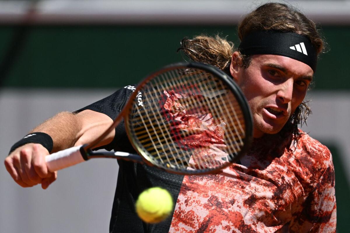 Greece's Stefanos Tsitsipas in action against Spain's Roberto Carballes Baena on day four of the French Open in Paris on Wednesday. — AP