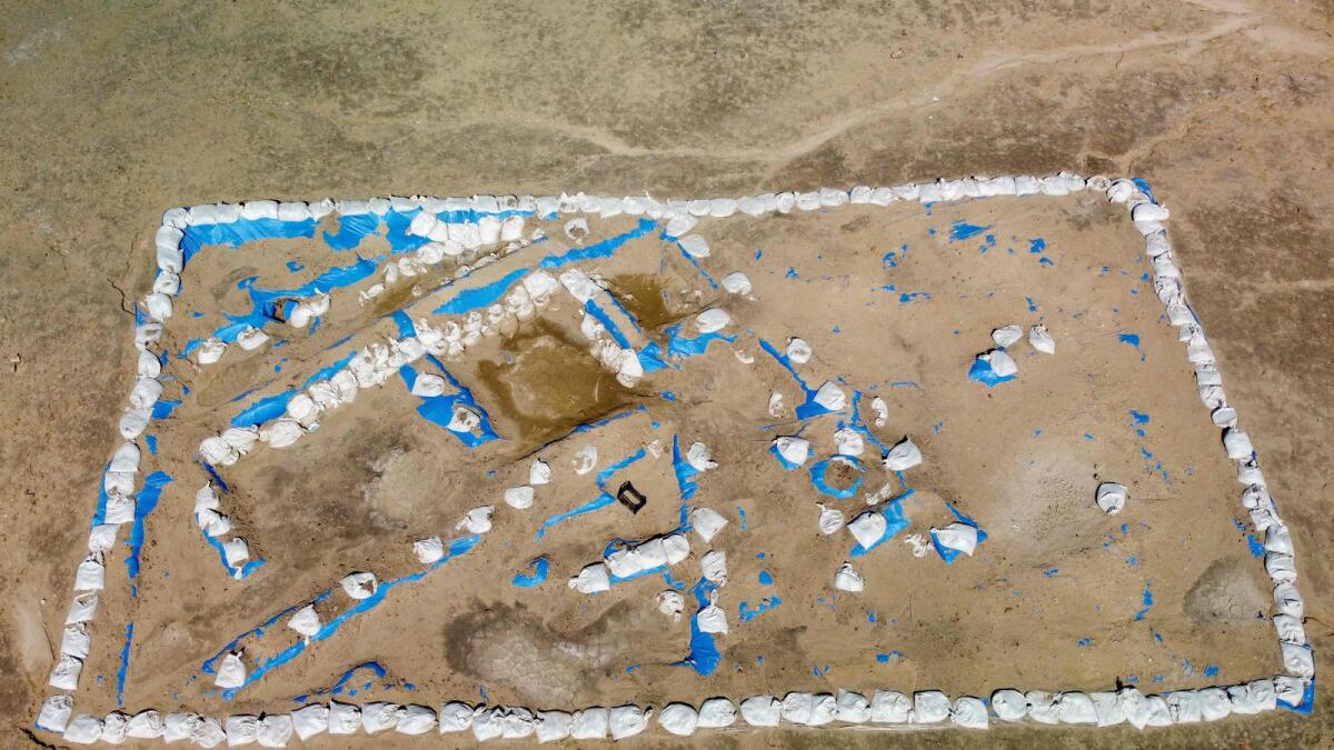 An aerial view of the newly-excavated trench which may have contained an inn with a cooling area for food storage, at the site of the ancient city-state of Lagash, in Iraq’s Al Shatra district of the southern Dhi Qar province. — afp
