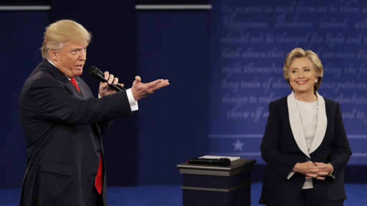 Clinton, Trump spar over lewd comments, emails in 2nd presidential debate