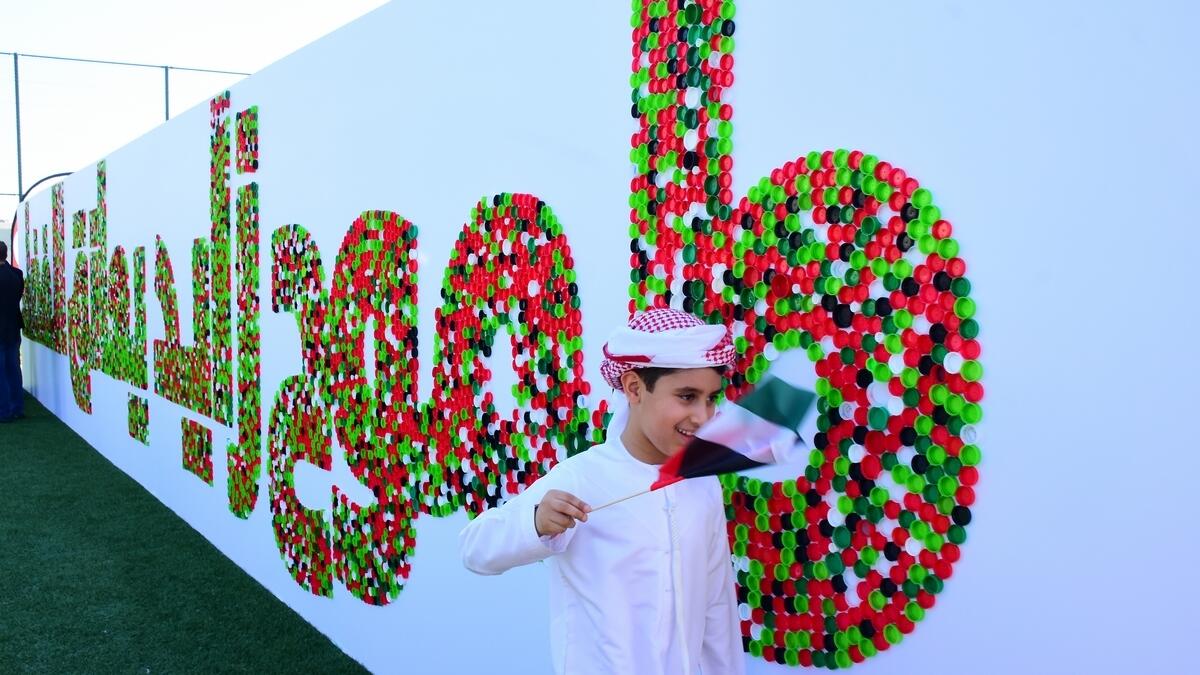 Dubai school, creates, world’s largest, plastic bottle cap, mosaic,  GEMS’ Al Barsha National School, UAE flag, 