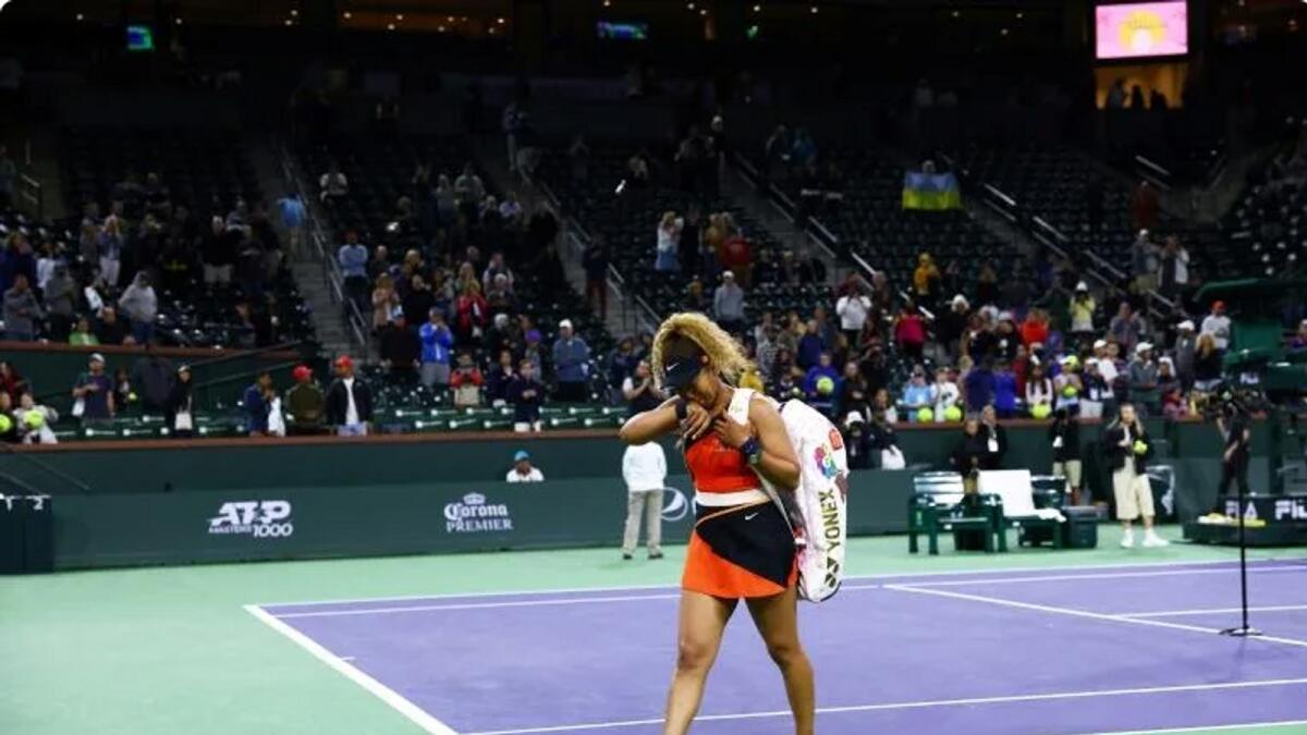 Japan's Naomi Osaka walks off court after a straight-sets defeat against Veronika Kudermetova during which she brought to tears by a heckler. Photo: AFP