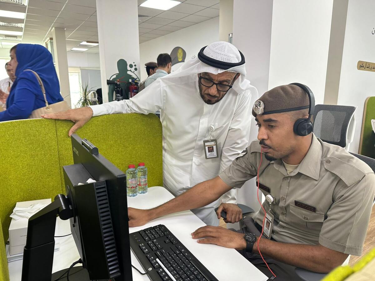 GDRFA director-general Lt General Mohammed Ahmed Al Marri overseeing the Virtual Amer Service (video call) at GDRFA HQ. Photo: Angel Tesorero