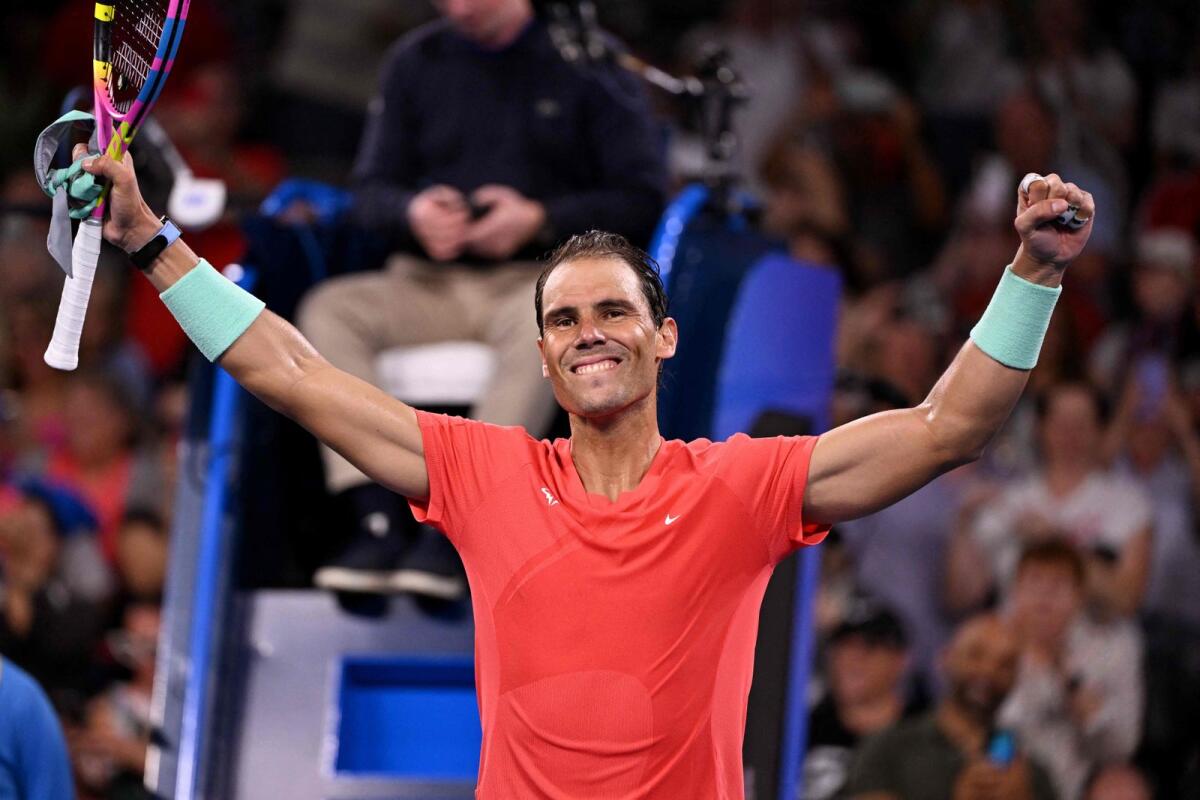 Rafael Nadal celebrates winning his match against Dominic Thiem. — AFP