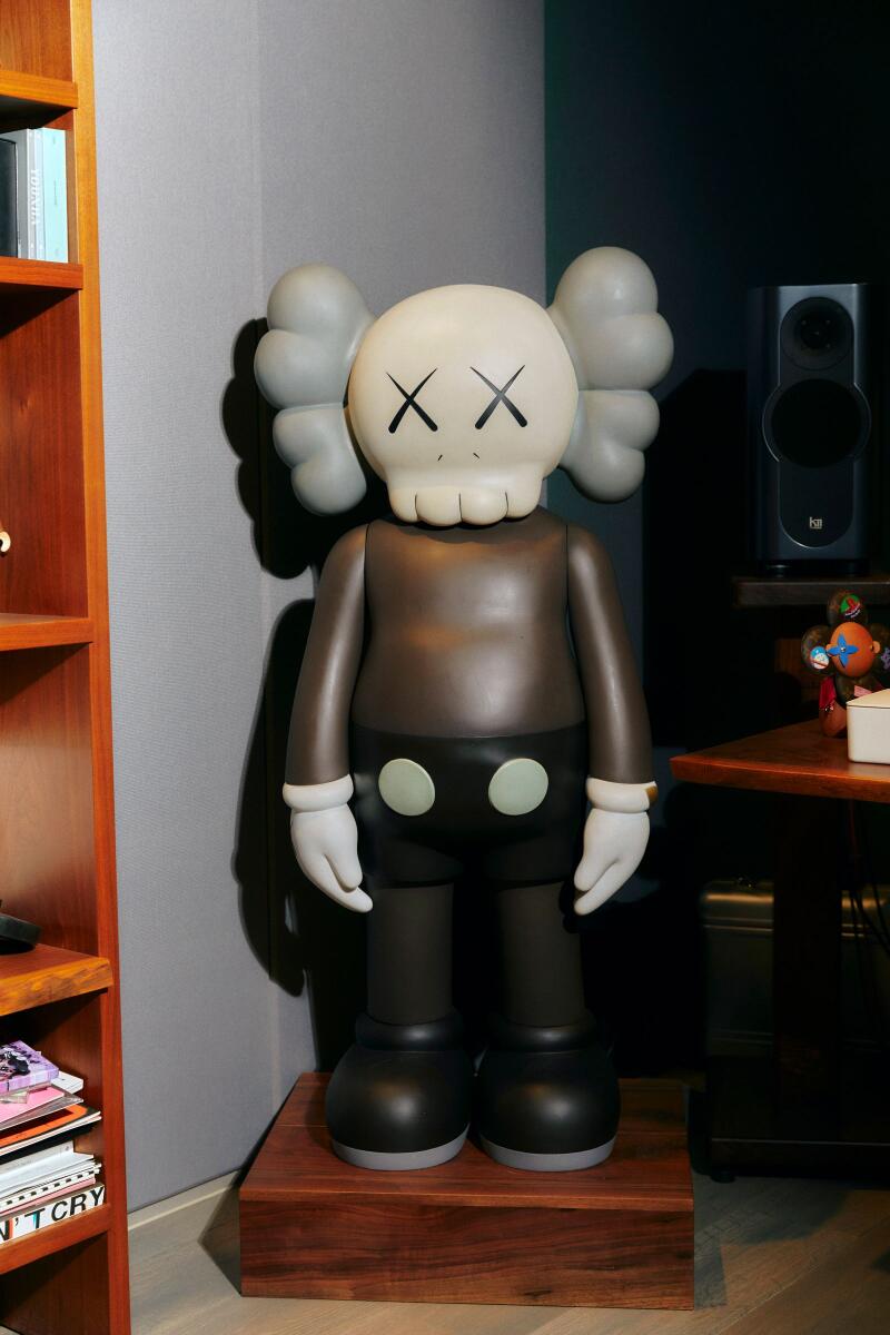 A piece by KAWS is displayed in the studio of RM, the leader of the South Korean pop group BTS, in Seoul, South Korea on Aug. 18, 2022. (Dasom Han/The New York Times)