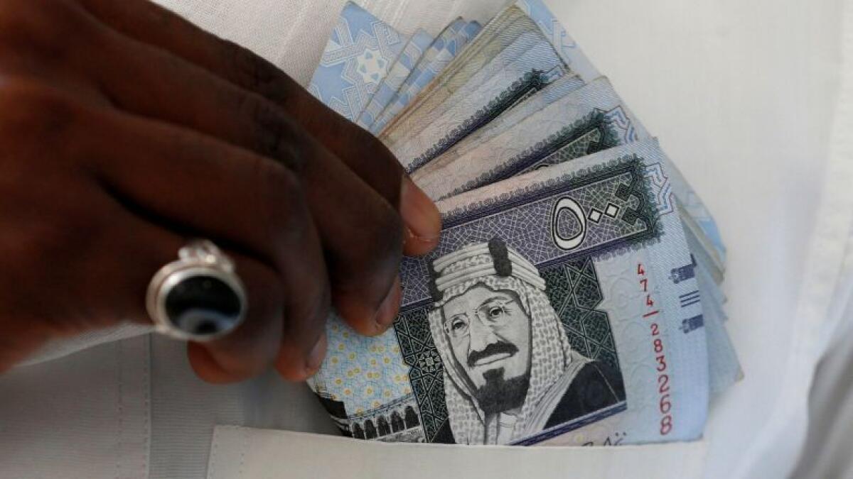 Saudi raises visa fees, traffic fines to boost revenues