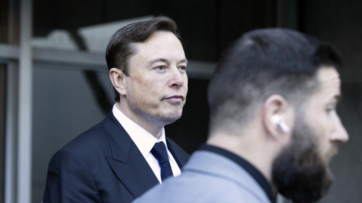 Elon Musk leaves the Phillip Burton Federal Building and United States Court House in San Francisco, earlier this year. In a letter issued on Thursday, May 18, 2023, a lawyer for Twitter owner Musk accused Microsoft of misusing the service's data and demanded an audit from the software giant. — AP
