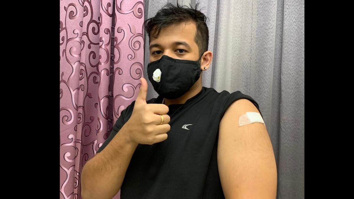 Sanchit Singh Thapa after getting his Covid vaccine in Dubai.