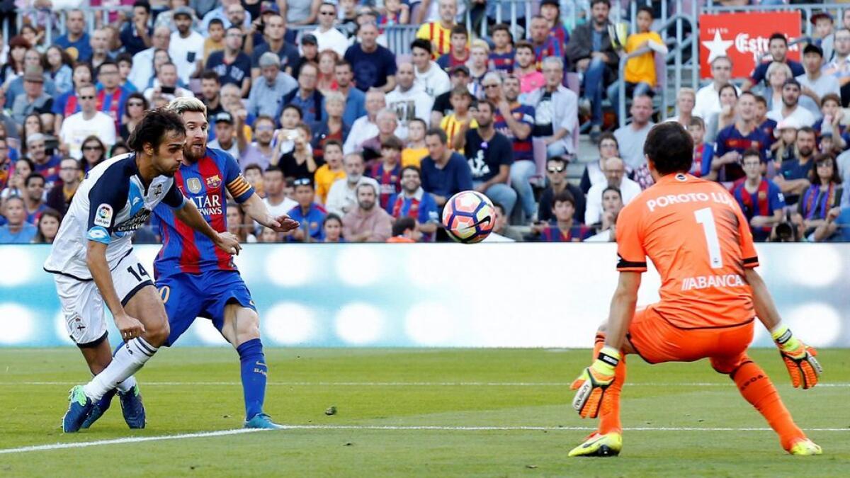 Returning Messi on target as Barca rout Deportivo