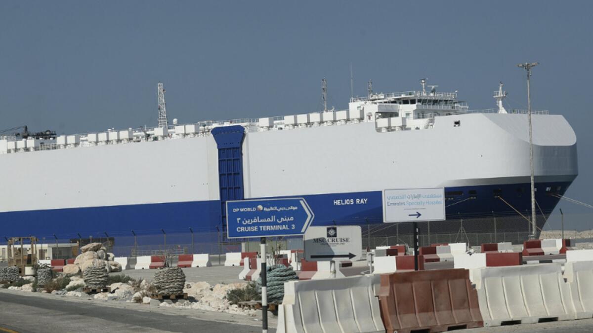 The Israeli-owned cargo ship, Helios Ray, docked in port after arriving earlier in Dubai on Sunday. AP
