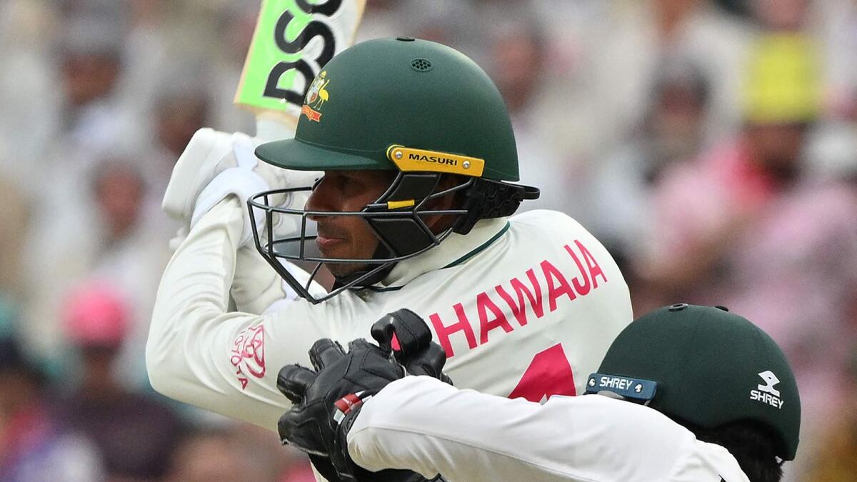 Australia’s batsman Usman Khawaja reached a personal milestone. - AFP