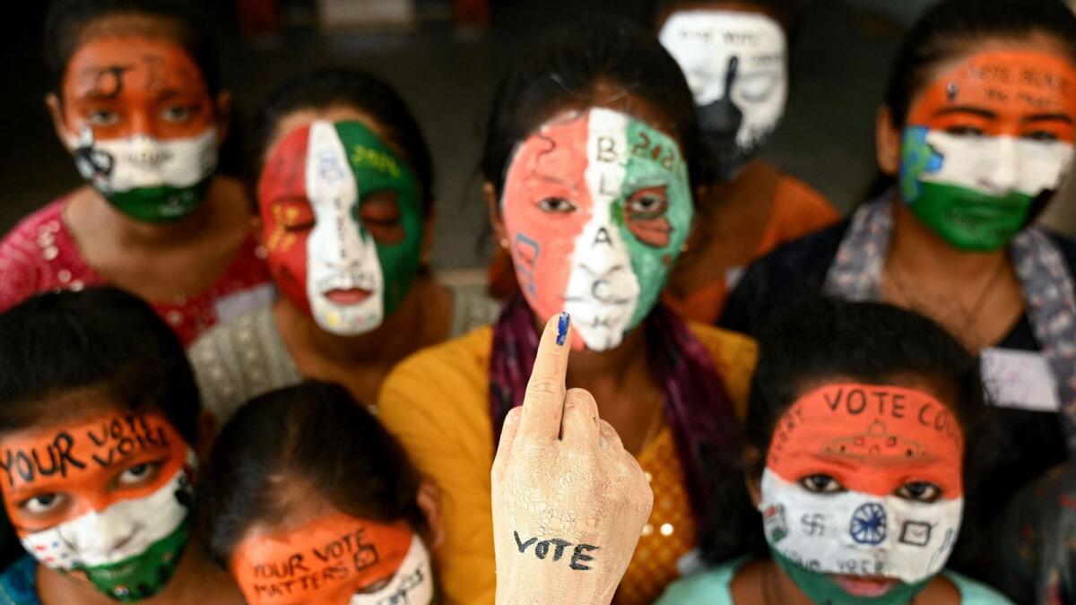 Students with painted faces spread awareness for voters ahead of India's upcoming national elections in Chennai. Photo: AFP