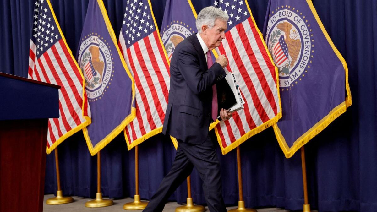 US Federal Reserve Chair Jerome Powell leaves after addressing reporters, after the Fed raised its target interest rate by a quarter of a percentage point, during a news conference at the Federal Reserve Building in Washington on Wednesday. - Reuters