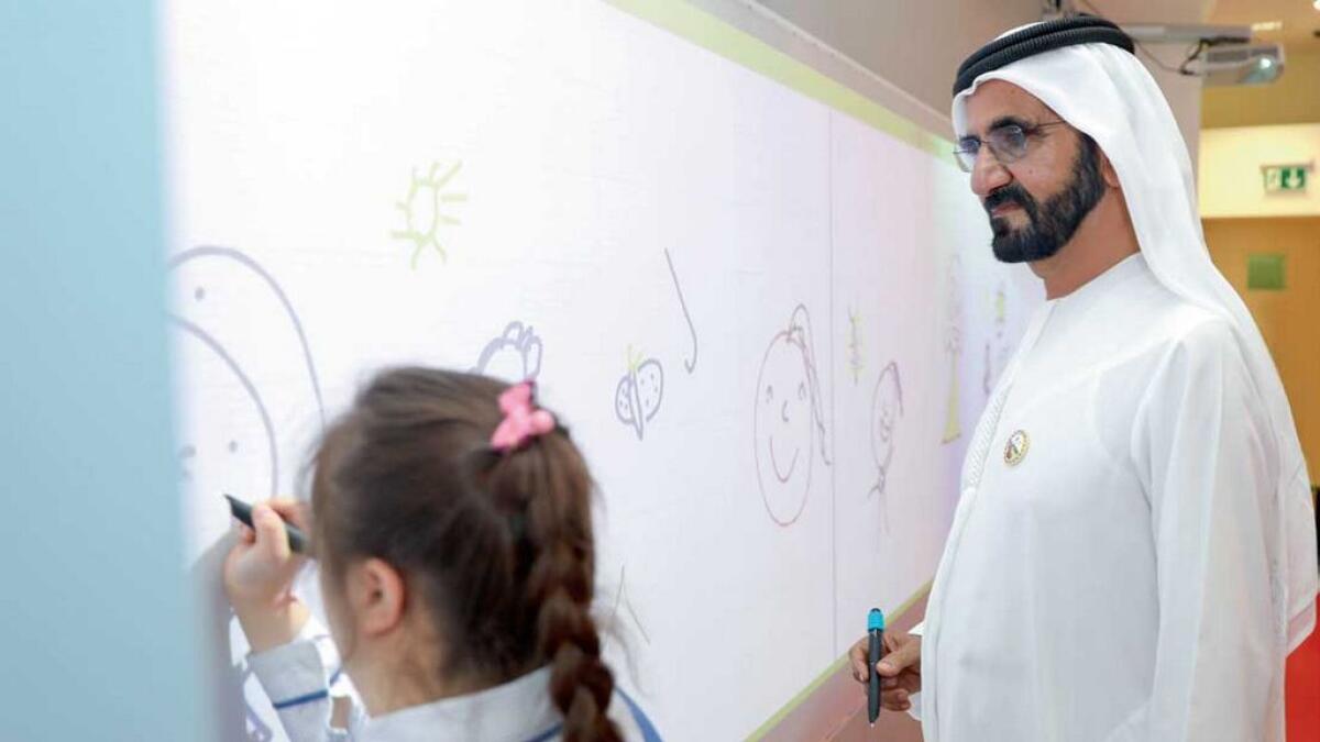 Sheikh Mohammed during a visit to the  Ministry of Community Development on Tuesday.  
