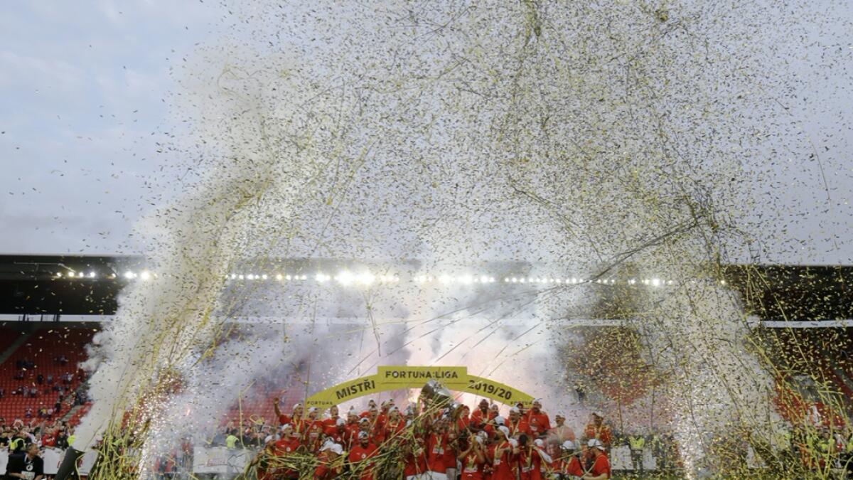 Slavia Prague celebrate with the trophy after winning the league. Photo: Reuters