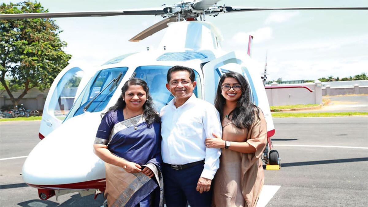 Joy Alukkas, managing director, Joyalukkas India Limited; Jolly Joy, Elsa Thomas with the Joyalukkas Group’s new luxury helicopter.