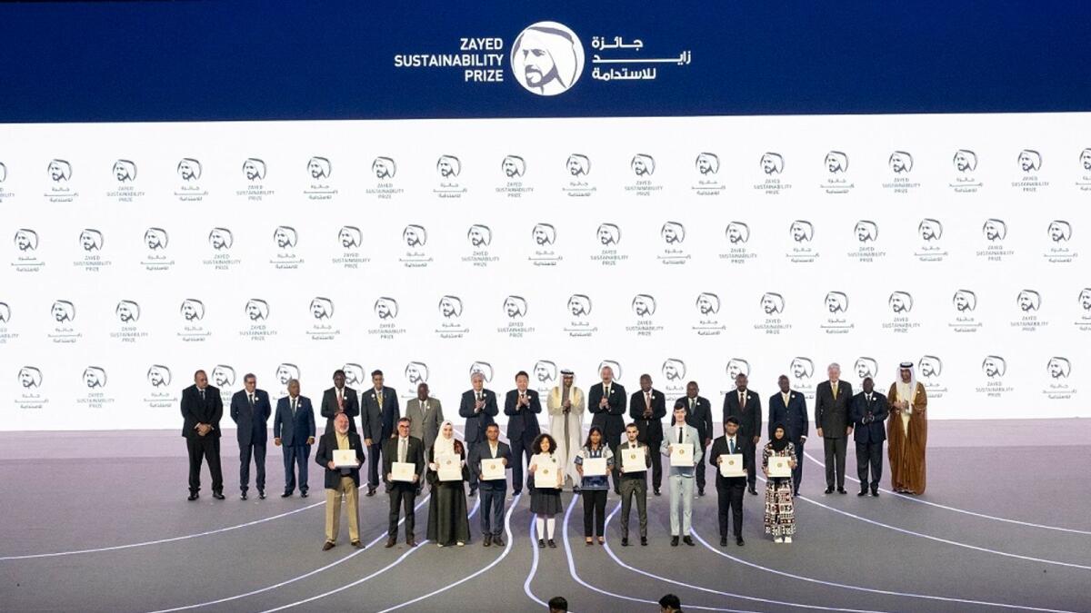 The President, His Highness Sheikh Mohamed bin Zayed Al Nahyan, with world leaders and winners of last year's Zayed Sustainability Prize.