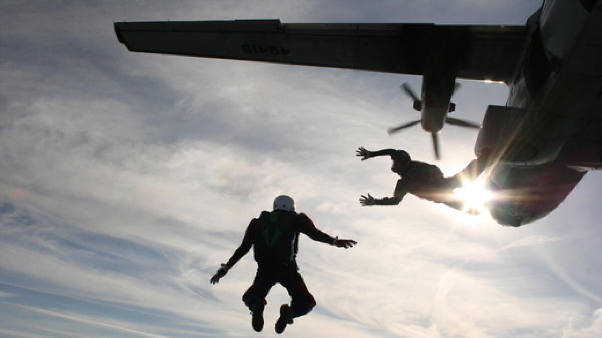Woman survives skydive after parachute fails to open