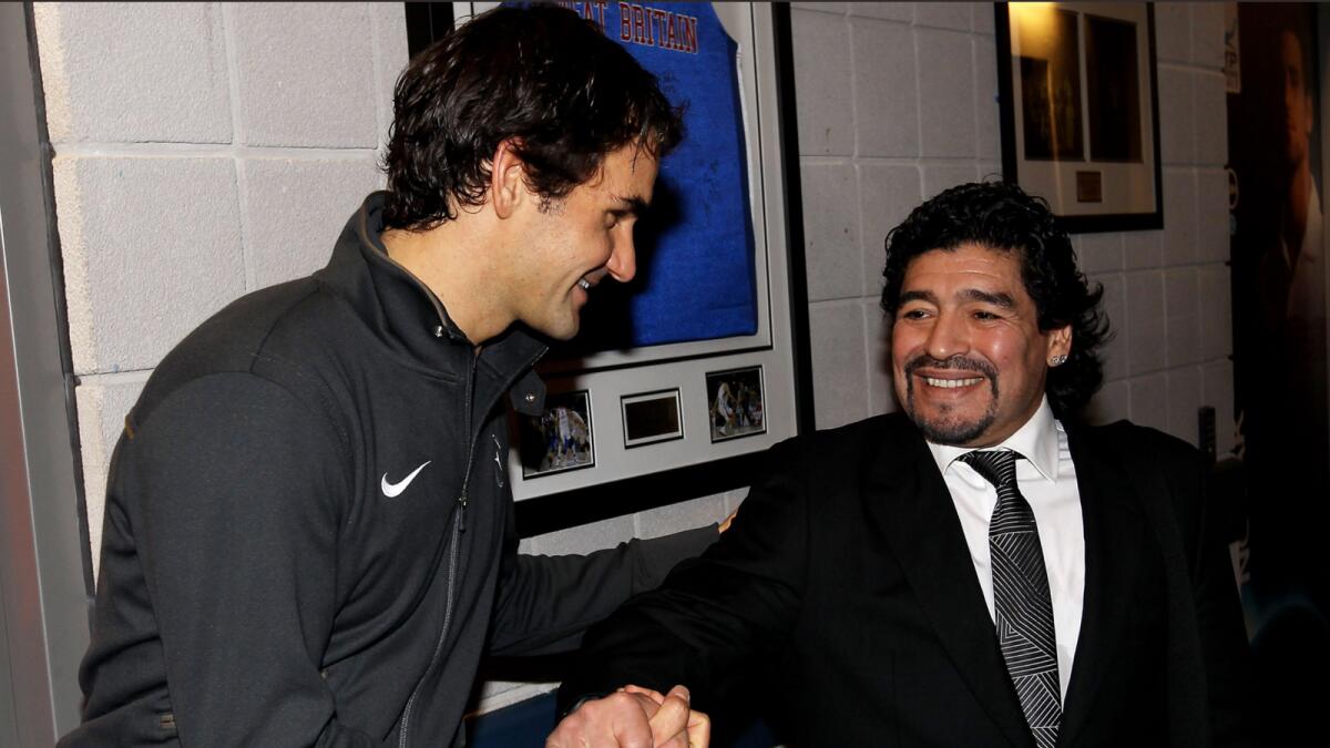 Roger Federer with Diego Maradona. (ATP Tour Twitter)