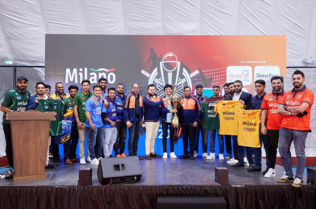 Anis Sajan with the coveted trophy alongside all the team owners and sponsors. — Supplied photo