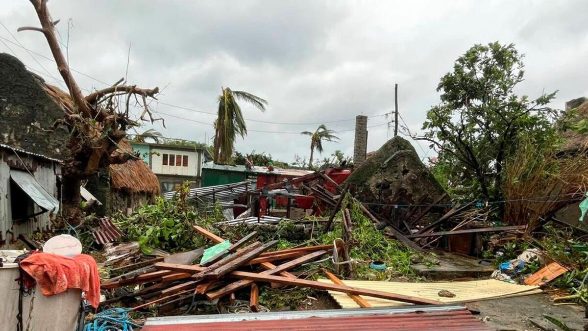 Damaged buildings and debris are seen after Typhoon Chanthu passed through Sabtang, Batanes, Philippines, in this September 12 image obtained via social media. Dennis Ballesteros Valdez via Reuters